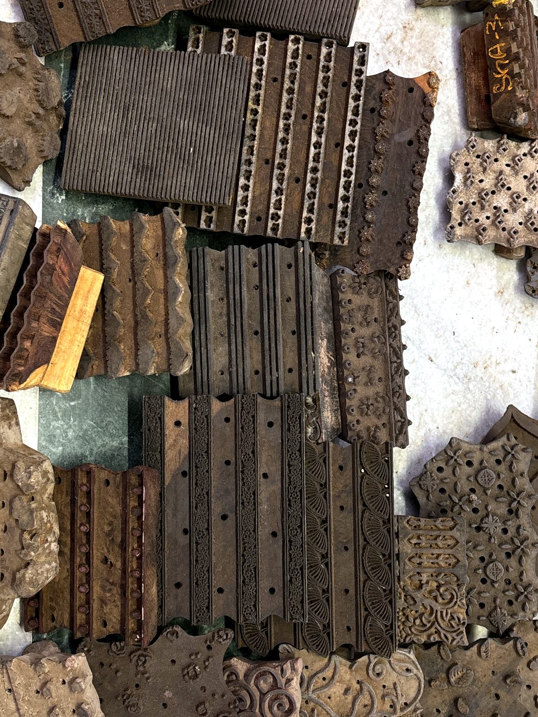 Carved border blocks laid side by side