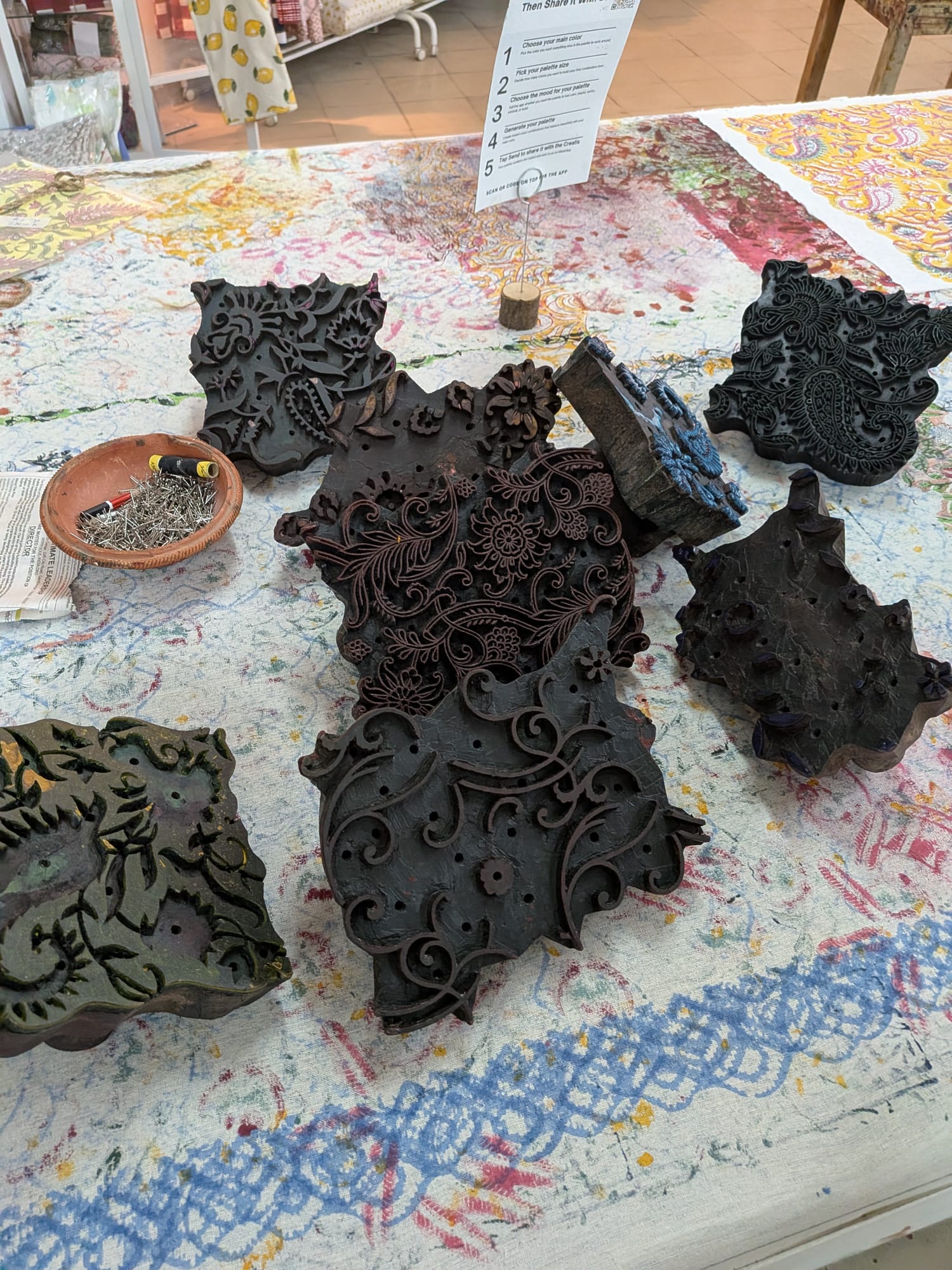 A collection of hand-carved wooden printing blocks displayed together