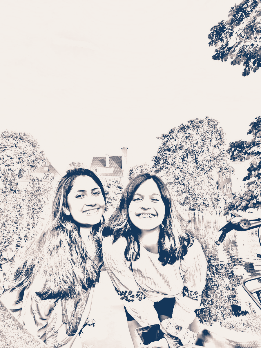 Hand-drawn sketch of Dimple and Akkriti, founders of Ghar, by an Amsterdam canal