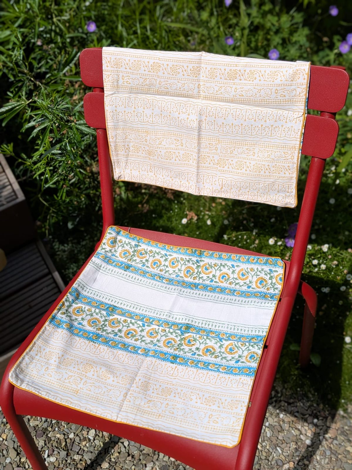 Gold and blue hand block printed floral trellis cushion cover